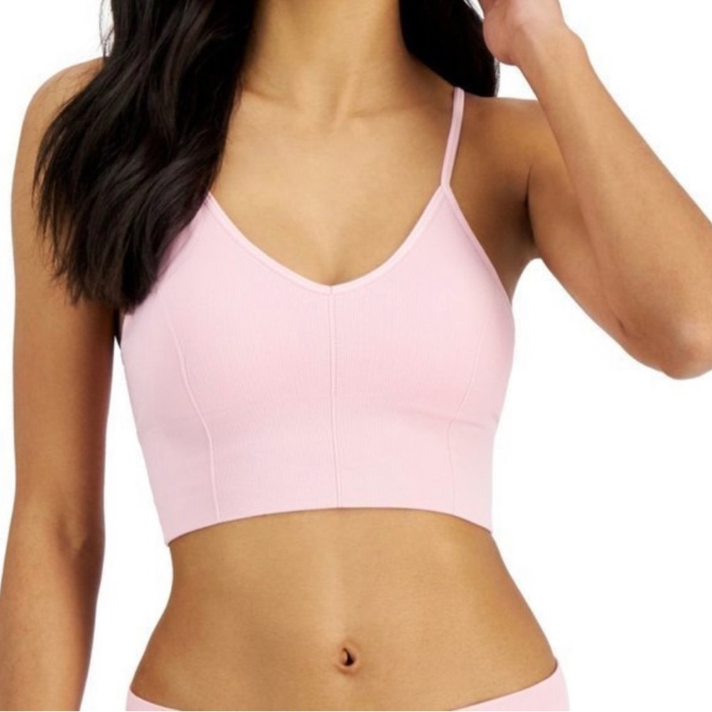 Pink, cropped, and padded, bralette with adjustable straps and slight ribbing